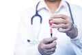 Doctor hand holding syringe and medicine vial Royalty Free Stock Photo