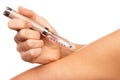 Doctor hand injecting medical insulin syringe pen