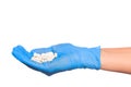 Doctor hand in sterile gloves holding  pill isolated on white background  close up view  - Image Royalty Free Stock Photo