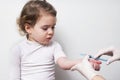 Doctor hand with syringe vaccinating child baby girl flu injection shot vaccination Royalty Free Stock Photo