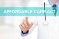 Doctor hand touching AFFORDABLE CARE ACT sign Royalty Free Stock Photo