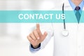 Doctor hand touching CONTACT US sign on virtual screen Royalty Free Stock Photo