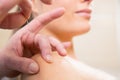 Doctor hands acupuncture needle pricking on woman