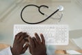 Doctor Hands Typing On Computer Keyboard Royalty Free Stock Photo