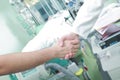 Doctor handshake as a sign of the success of treatment