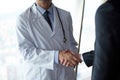 Doctor handshake with a patient Royalty Free Stock Photo
