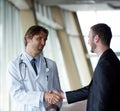 Doctor handshake with a patient