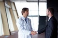 Doctor handshake with a patient