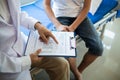 doctor is having consultation discussing prostate cancer and venereal cancer detected in young man. Current doctors provide advice