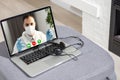 Doctor Having Video Conference On Laptop With Colleagues Royalty Free Stock Photo