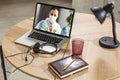 Doctor Having Video Conference On Laptop With Colleagues Royalty Free Stock Photo