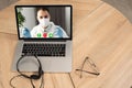 Doctor Having Video Conference On Laptop With Colleagues Royalty Free Stock Photo