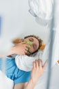 doctor in hazmat suit examining patient Royalty Free Stock Photo