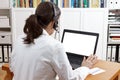 Doctor headset laptop blank screen Royalty Free Stock Photo