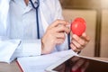 Doctor with Heart Disease Checker Royalty Free Stock Photo