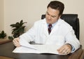 Doctor at his Desk Royalty Free Stock Photo