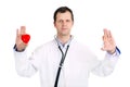 Doctor hold heart and a cigaret Royalty Free Stock Photo