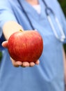 Doctor Holding Apple Royalty Free Stock Photo