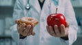 The doctor holding an apple.AI generated image Royalty Free Stock Photo