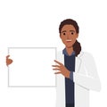 Doctor holding blank board in his hands. Doctor female personage presenting sign Royalty Free Stock Photo