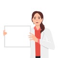 Doctor holding blank board in his hands. Masked doctor female personage presenting sign Royalty Free Stock Photo