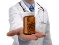 Doctor holding bottle of pills Royalty Free Stock Photo