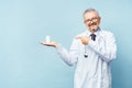 Doctor holding bottle of pills on white background. The concept of medicine, pharmacology, healthcare Royalty Free Stock Photo