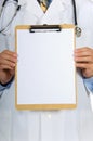 Doctor holding clipboard Royalty Free Stock Photo