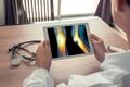 Doctor holding a digital tablet with pain on the knee and bones of the leg Royalty Free Stock Photo