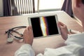 Doctor holding a digital tablet with x-ray of knee with pain on the bones and leg Royalty Free Stock Photo