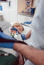 Doctor holding endoscope during gastroscopy in hand