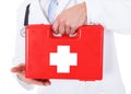 Doctor holding first aid box Royalty Free Stock Photo