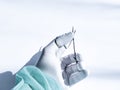 Doctor holding forceps Royalty Free Stock Photo