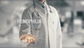 Doctor holding in hand Hemophilia