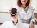 Doctor holding in his hand blood sugar test