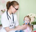 Doctor holding inhaler mask for kid breathing Royalty Free Stock Photo