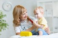 Doctor holding inhaler mask for kid breathing Royalty Free Stock Photo