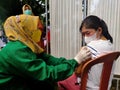 Doctor holding injection doing vaccine