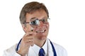 Doctor holding magnyfying lens over eye Royalty Free Stock Photo