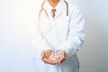 Doctor holding medicine. on white background Royalty Free Stock Photo