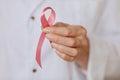 Doctor Holding Pink Ribbon Close Up Royalty Free Stock Photo