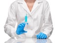 Doctor holding with plastic white syringe with blue drug Royalty Free Stock Photo