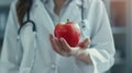 Doctor Holding a Red Apple.AI generated image Royalty Free Stock Photo