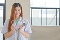 Doctor holding a stethescope Royalty Free Stock Photo