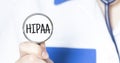Doctor holding a stethoscope with text HIPAA, medical concept Royalty Free Stock Photo