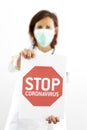 Doctor holding a stop coronavirus sign
