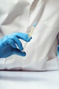 Doctor holding a subcutaneous vaccine of preventive medicine in the medical office