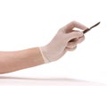 A doctor holding a surgical scalpel Royalty Free Stock Photo