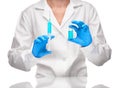 Doctor holding syringe and ampoule with blue drug against white Royalty Free Stock Photo