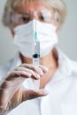 Doctor preparing a dose for a patient of the third vaccine for Covid-19 Royalty Free Stock Photo